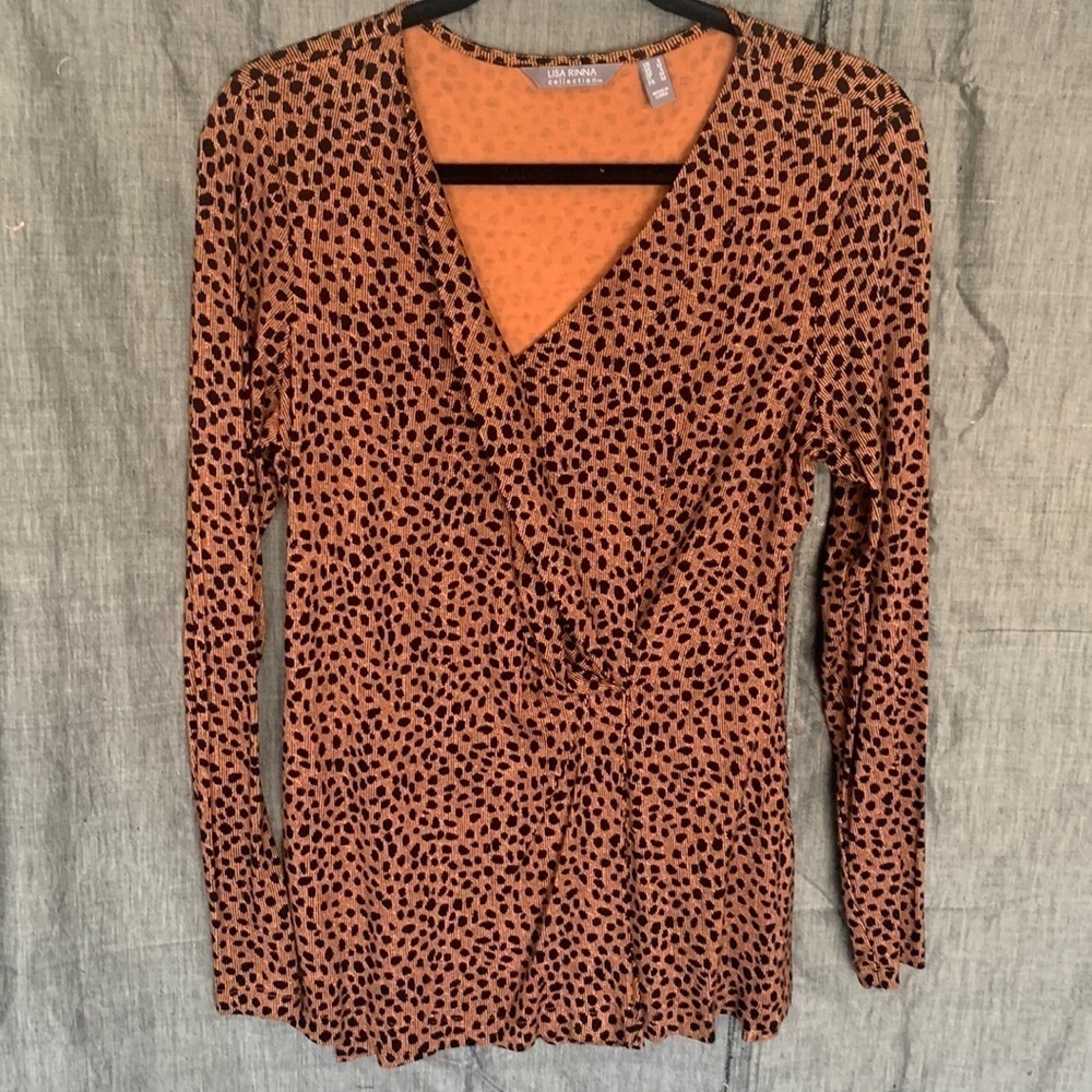 Lisa Rinna top with long sleeves and crossbody closure